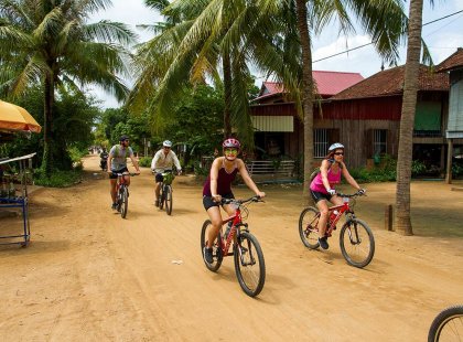Cycle through the town and villages of Southern Thailand
