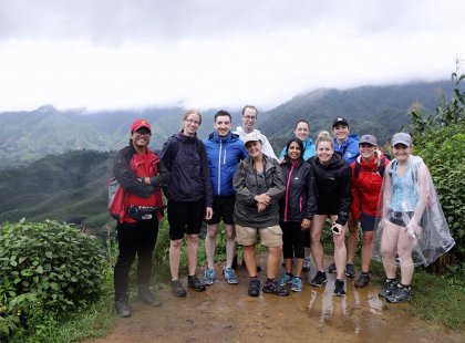 An Intrepid Travel group celebrating after completing a hike in Sapa, Vietnam.