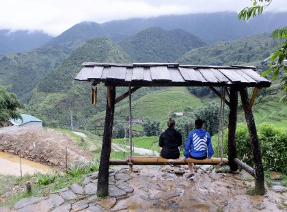 Travellers taking in the sights of the landscape in Sapa, Vietnam on an Intrepid Travel trip.