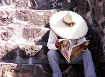 Local Mexican man reading paper in Sombrerro