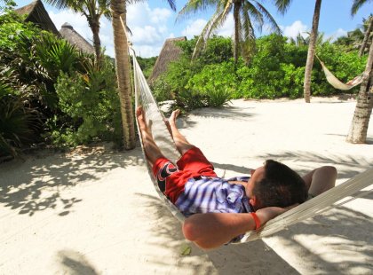 Intrepid Travel mexico yucatan peninsula person in hammock