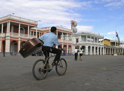 Intrepid travel nicaragua grenada man on bike