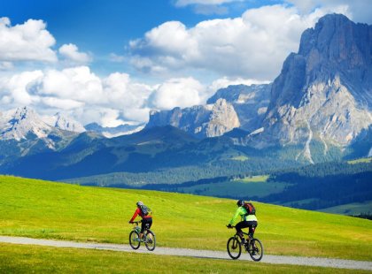 Intrepid Travel italy alpe di suisi cyclists in mountains