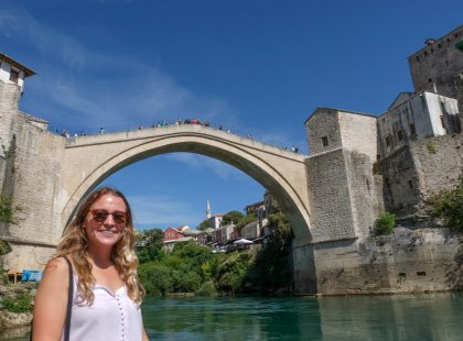 Traveler standing infron of a bridge at Bosnia