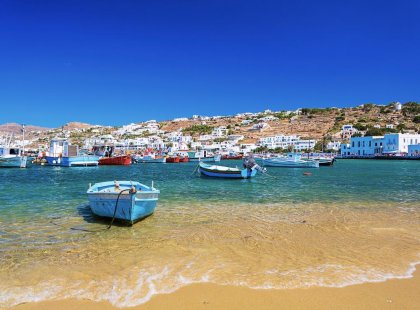 Boats in the turquoise water of Mykonos in Greece