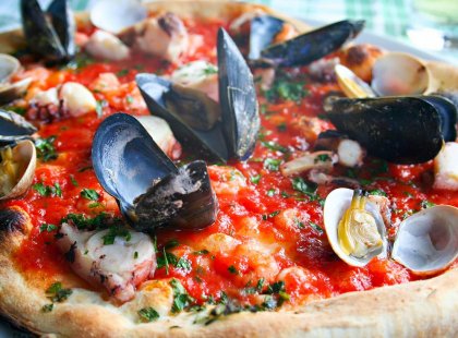 Pizza from with fresh seafood from Naples, Italy.