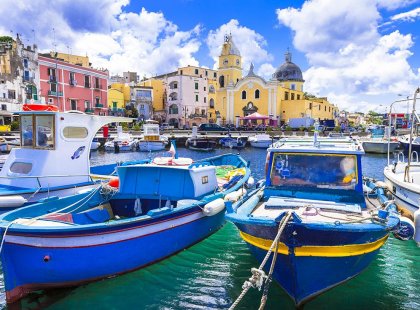 Boats moored in the Procida harbour on the Amalfi Coast, Italy