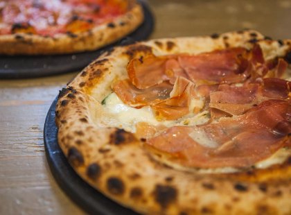 Eat pizza at the Centrale Market in Florence, Italy