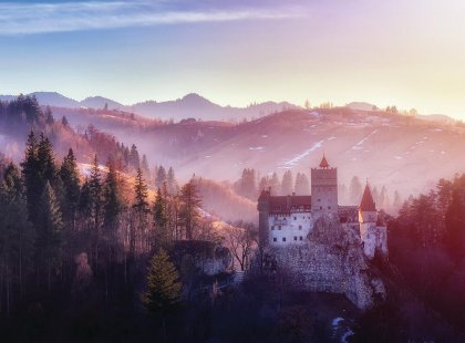 Dracula Castle in Transylvania, Romania. The castle is located on top of a mountain.