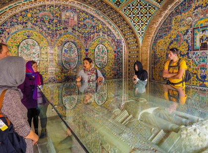 Tour group and leader in Golestan Palace, Tehran, Iran