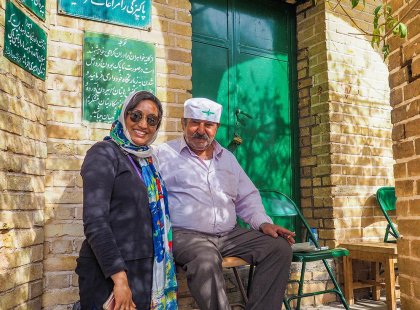 Traveller and local man in Iran