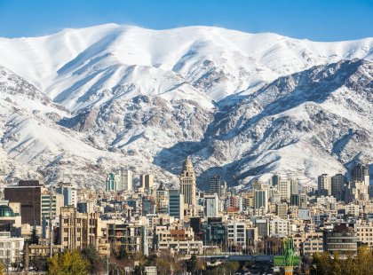 Winter Tehran view with a snow covered Alborz Mountains in background.