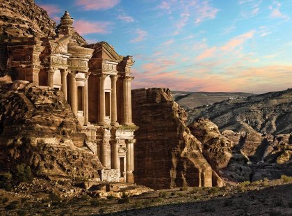 jordan petra monastary carved into rockface cliff ancient mountain