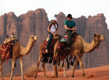 jordan wadi rum local transport camels tourists journey trek desert