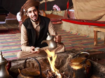 Serving tea in a Bedouin tent in Jordan