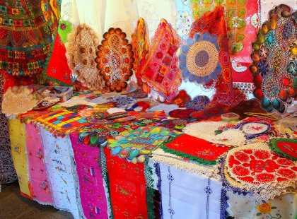 Display of Nanduti, a traditional Paraguayan embroidered lace, at a street market in Asuncion, Paraguay as seen on an Intrepid Travel tour.