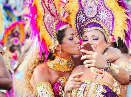 Carnival in Rio with Intrepid Travel - performers in the parade take a selfie