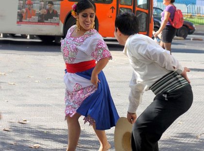 Witness some authentic dancing on the streets of Santiago