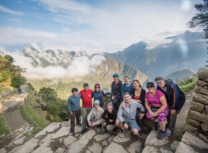 Group of travellers at Machu Picchu in Peru on an Intrepid Travel tour