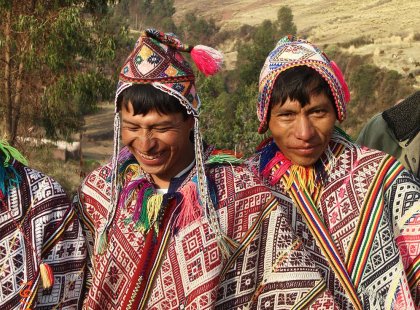 Two local men in traditional Peruvian dress and ponchos, Peru