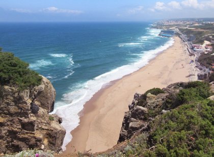 Hike along the dramatic coastline in Sintra-Cascais Natural Park with sweeping views of the wild Atlantic and sandy beaches. We make our way to Praia Grande or “Big Beach” for a short walk in the sand before reaching a seaside restaurant for lunch.