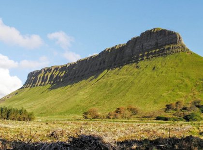 On day 2 we summit Ben Bulben in County Sligo.  The poet W.B. Yeats wrote his greatest work based on his childhood climbs of the dramatic flat-topped peak. He is laid to rest in a little graveyard at the base of the mountain.