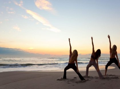 Immerse yourself in a seaside yoga session.