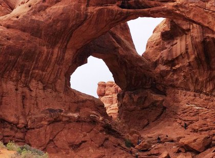 A ‘rest’ day hike through Arches National Park before a van transfer to Naturita will offer mind-blowing views of arches like Double Arch.